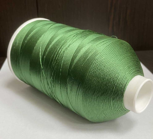 Лавсановая нить для оверлока зеленая вторичная фото 3