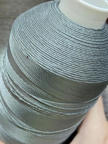 Лавсановая нить для оверлока св.серая Вторичная фото 2