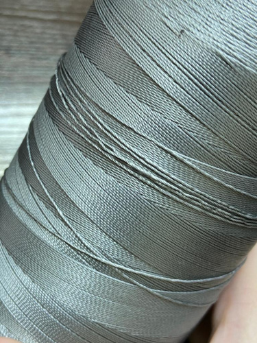 Лавсановая нить для оверлока св.серая Вторичная фото 6