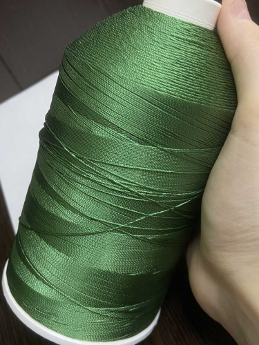 Лавсановая нить для оверлока зеленая вторичная фото 2